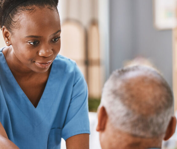 Help, support and medical with nurse and old man for retirement, rehabilitation or healing. Empathy, physical therapy and healthcare with patient and black woman in nursing home for caregiver service