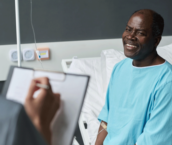 Patient talking to nurse during her visit