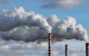 detail of white smoke polluted sky