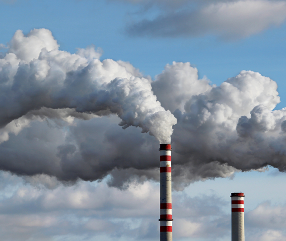detail of white smoke polluted sky